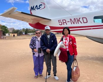 Jean Celien, wife and niece in front of MAF plane in Mandritrsara