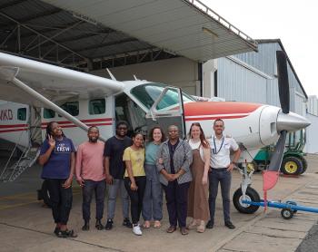 Mercy Ships Patient Selection Team with MAF pilot