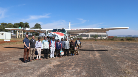Translation team on Antsirabe Airstrip in front of MAF plane