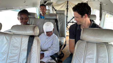 Patient Angelo BETOMBO (called Lolo) in the Plane