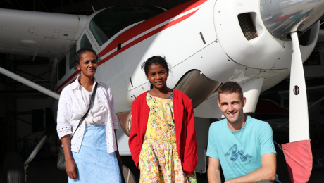 Sarah, her mother, Vivian and Doctor Jeshiah Theissen in front of MAF plane