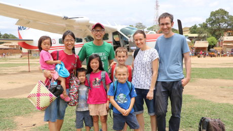 Chin family and Watts family together in front of MAF plane in Mandritsara