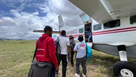 Passengers boarding MAF plane