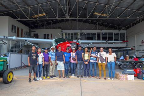 Medair team in front of MAF plane